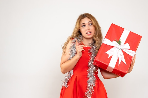 Expressive young woman posing for Christmas