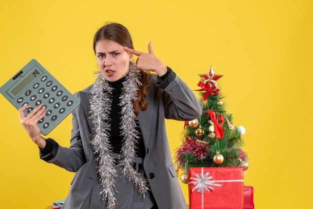 Expressive young woman posing for Christmas