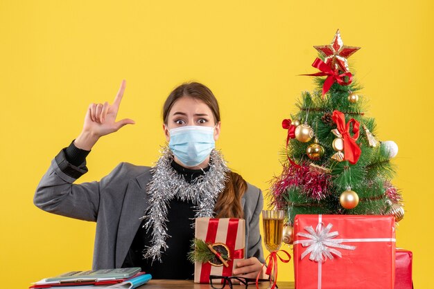 Expressive young woman posing for Christmas