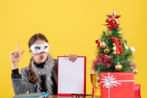 Expressive young woman posing for Christmas