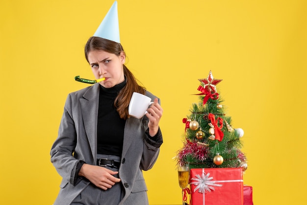 Expressive young woman posing for Christmas