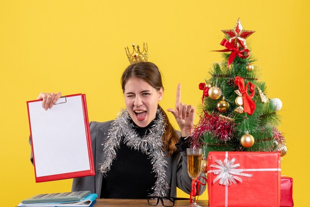 Expressive young woman posing for Christmas