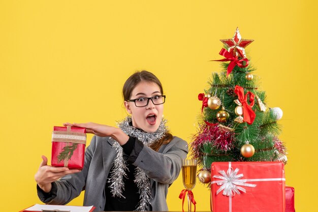 Expressive young woman posing for Christmas