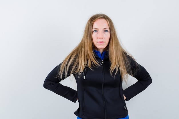 Expressive young woman posing in the studio