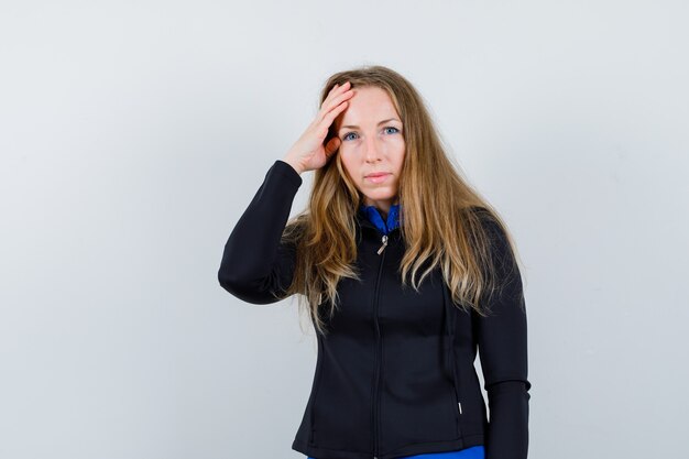 Expressive young woman posing in the studio