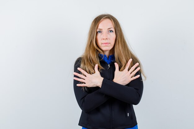 Expressive young woman posing in the studio