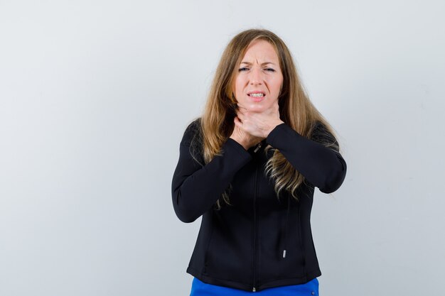 Expressive young woman posing in the studio