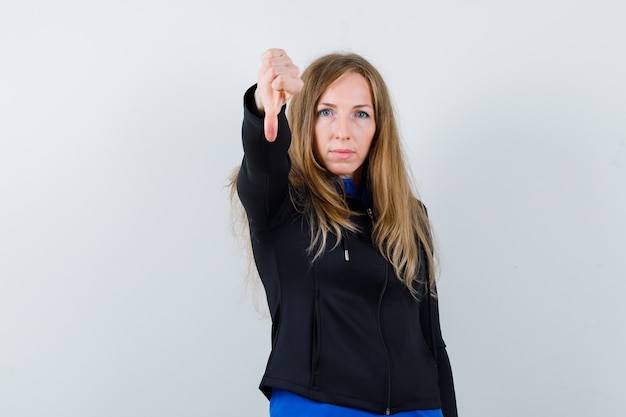 Expressive young woman posing in the studio