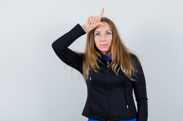 Expressive young woman posing in the studio