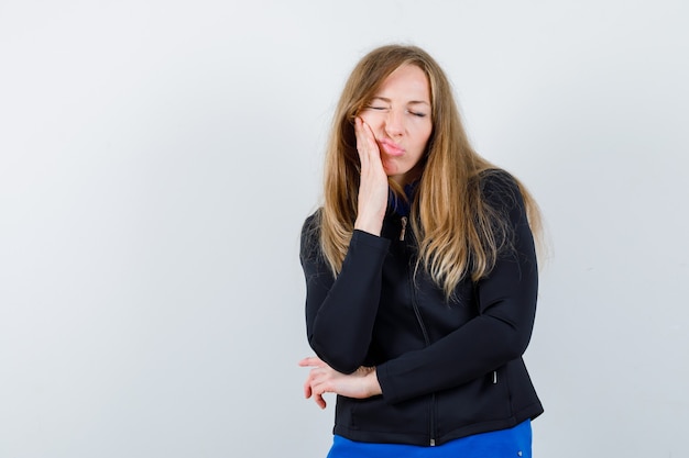 Expressive young woman posing in the studio