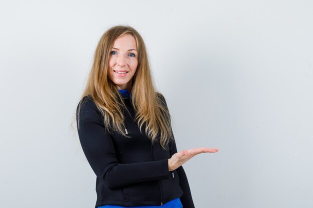 Expressive young woman posing in the studio