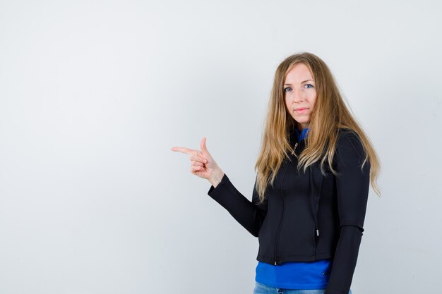 Expressive young woman posing in the studio