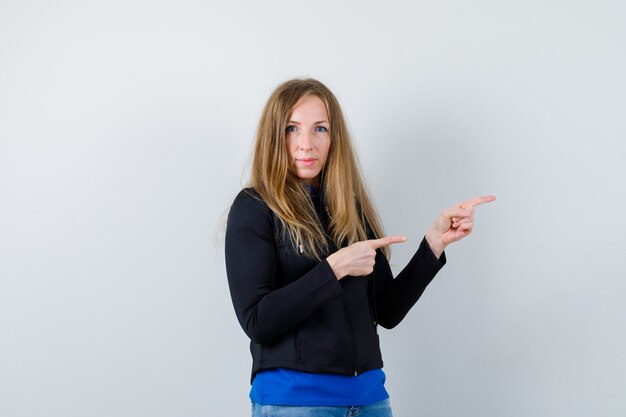 Expressive young woman posing in the studio