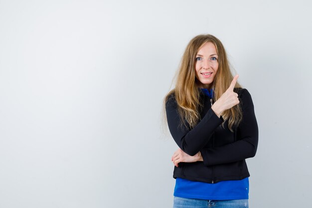 Expressive young woman posing in the studio