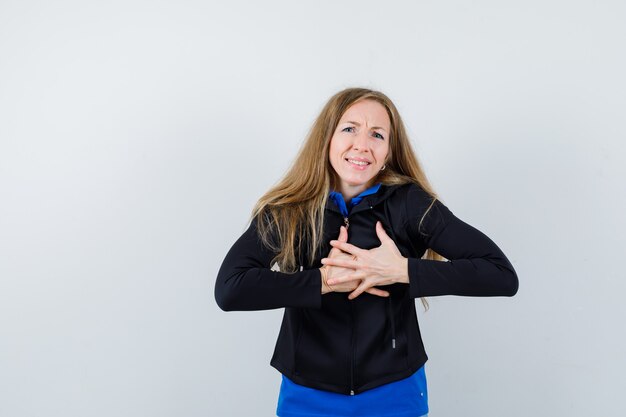 Expressive young woman posing in the studio