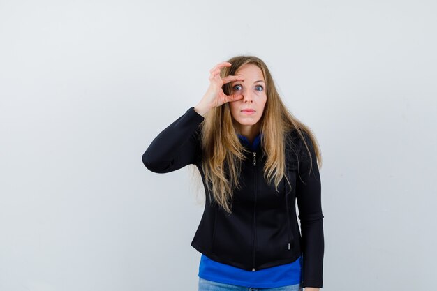 Expressive young woman posing in the studio