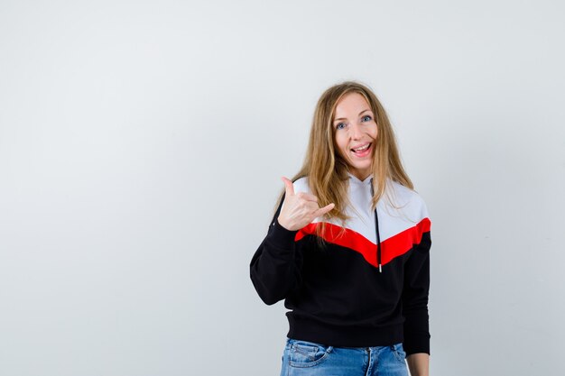 Expressive young woman posing in the studio