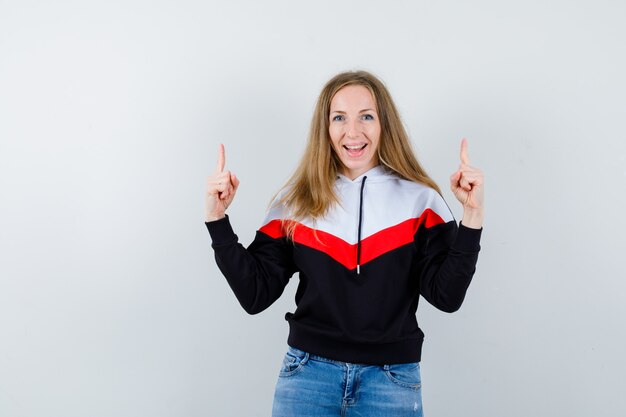 Expressive young woman posing in the studio