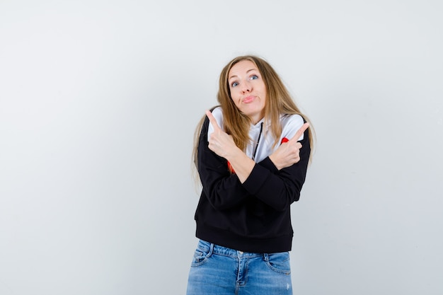 Expressive young woman posing in the studio