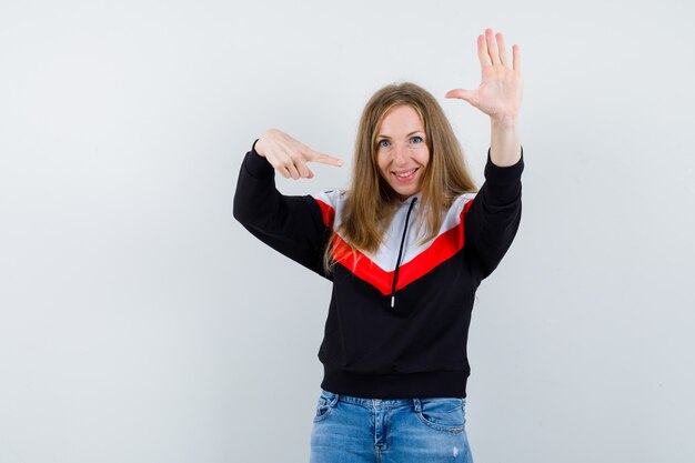 Expressive young woman posing in the studio