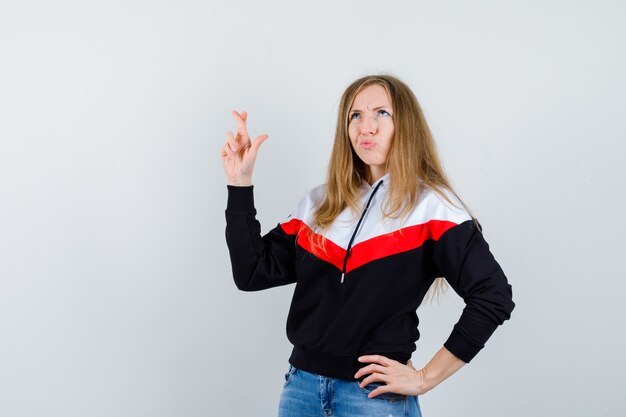 Expressive young woman posing in the studio