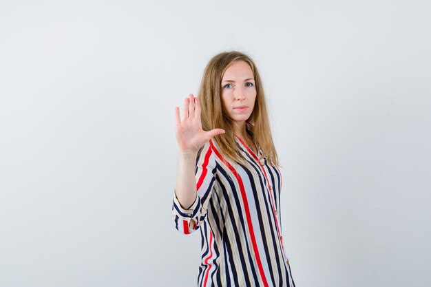 Expressive young woman posing in the studio