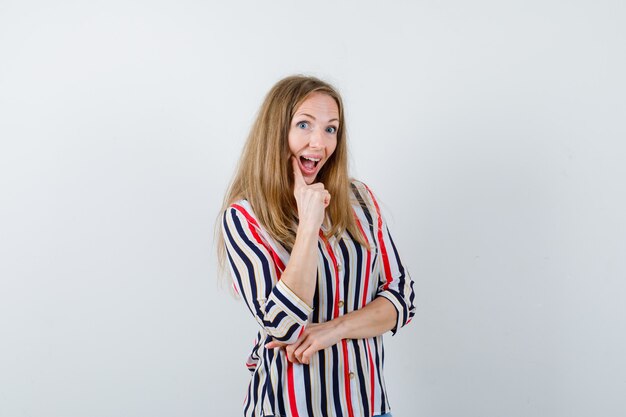 Expressive young woman posing in the studio