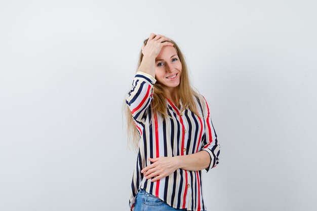 Expressive young woman posing in the studio