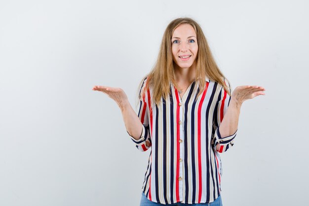 Expressive young woman posing in the studio