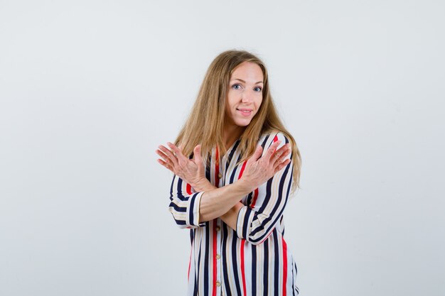 Expressive young woman posing in the studio