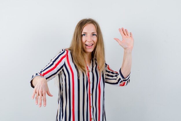 Expressive young woman posing in the studio