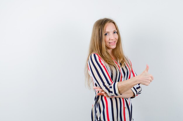 Expressive young woman posing in the studio