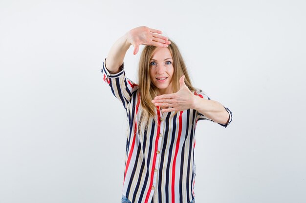 Expressive young woman posing in the studio