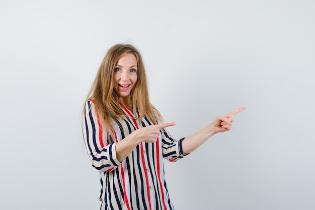 Expressive young woman posing in the studio