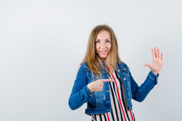 Expressive young woman posing in the studio