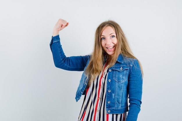 Expressive young woman posing in the studio