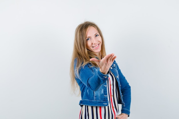 Expressive young woman posing in the studio