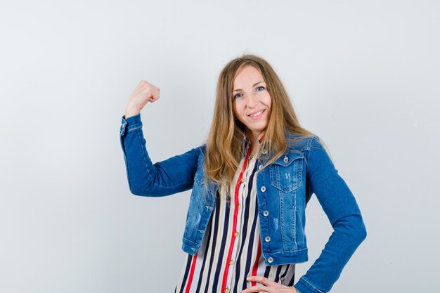 Expressive young woman posing in the studio