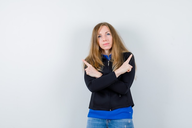 Free photo expressive young woman posing in the studio