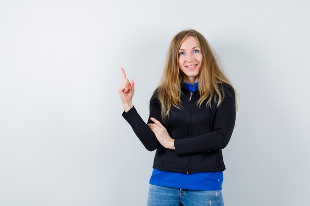 Expressive young woman posing in the studio