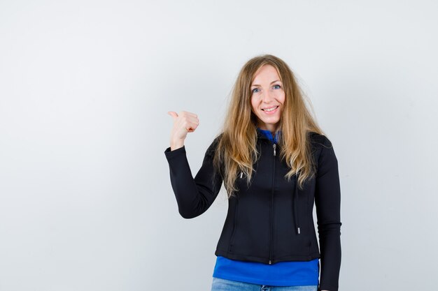 Expressive young woman posing in the studio