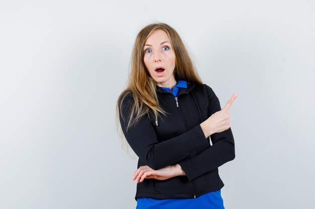 Expressive young woman posing in the studio