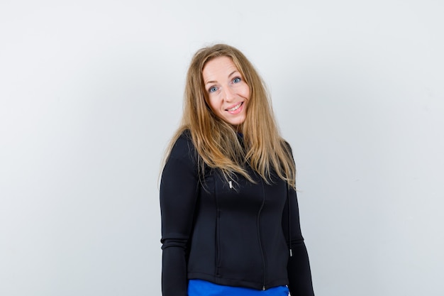 Expressive young woman posing in the studio