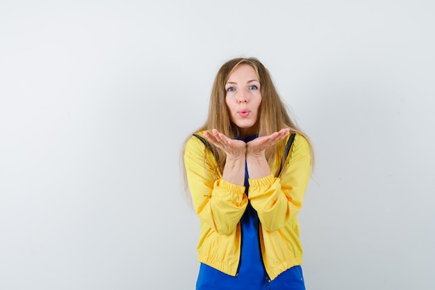 Expressive young woman posing in the studio