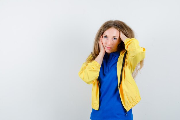 Expressive young woman posing in the studio