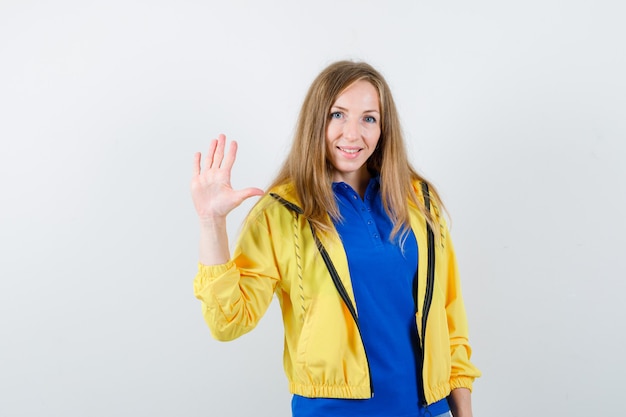 Expressive young woman posing in the studio