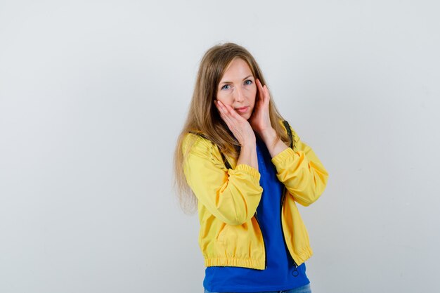 Expressive young woman posing in the studio