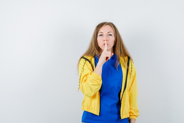 Expressive young woman posing in the studio