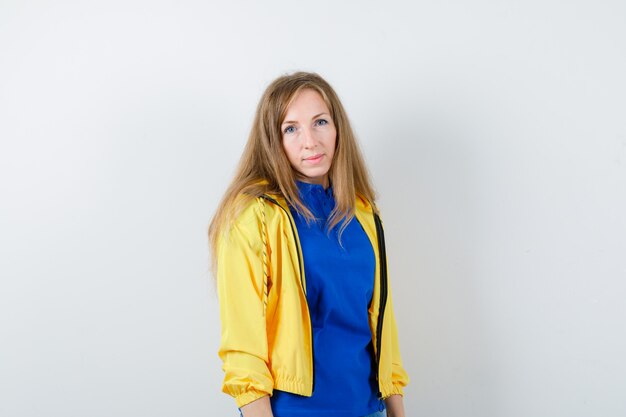 Expressive young woman posing in the studio