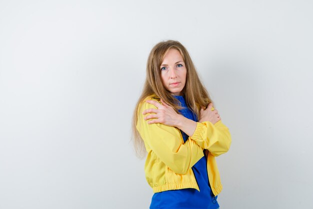 Expressive young woman posing in the studio